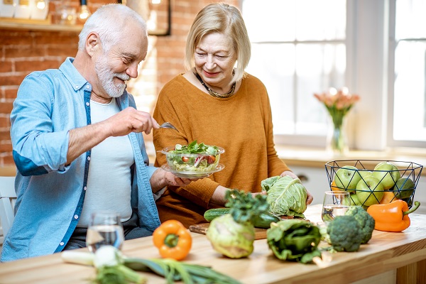 Man and woman preparing a healthy meal